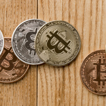 Bunch bitcoins wooden table